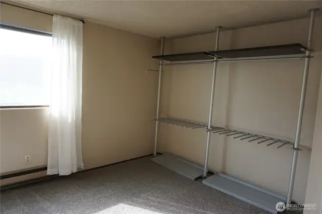 Open closet system with space for a dresser or desk