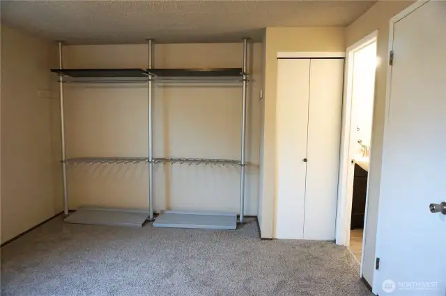 Bedroom also has an enclosed closet as well as separate access to the bathroom