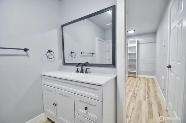 Large walk in closet off primary bathroom