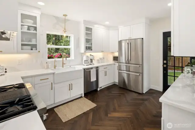 There are herringbone floors, a Bosch fridge and a new back door.