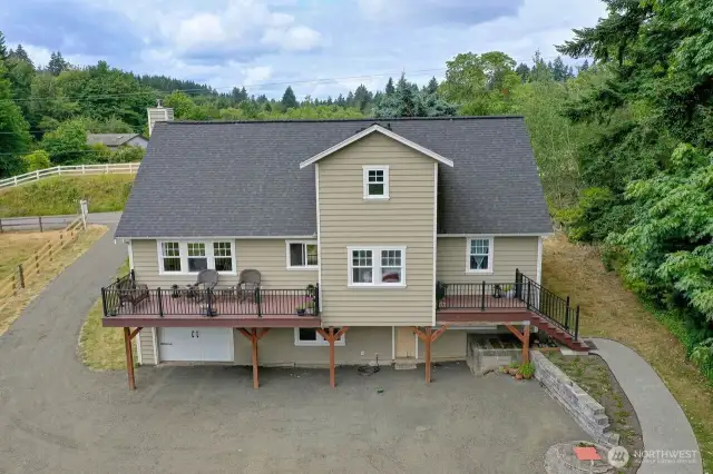 The back of the home has that classic farmhouse look, very nice.