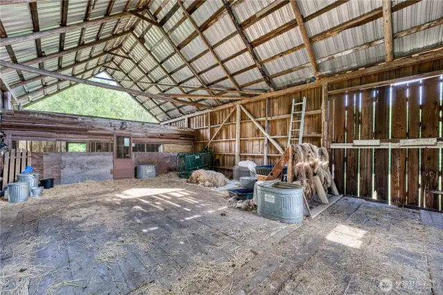 Inside the big barn with stable area.