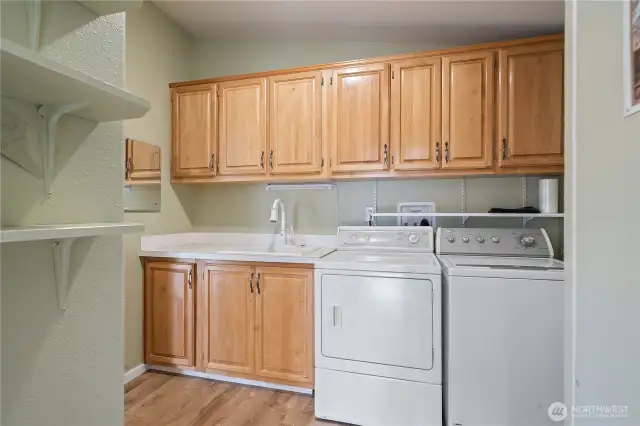 Laundry area with lots of storage space
