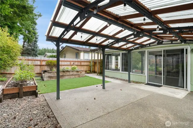 Be outside whatever the weather under on this covered patio!