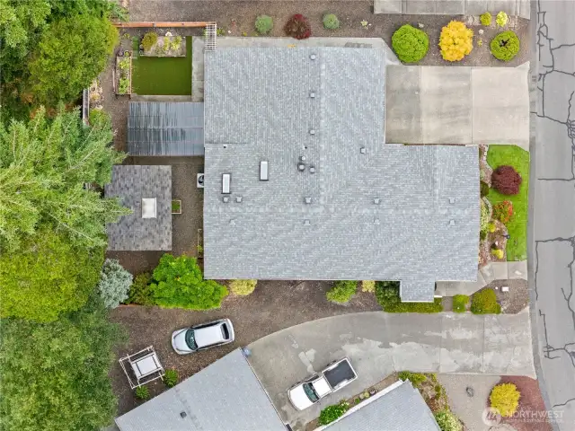 Overhead view shows the storage building and covered patio
