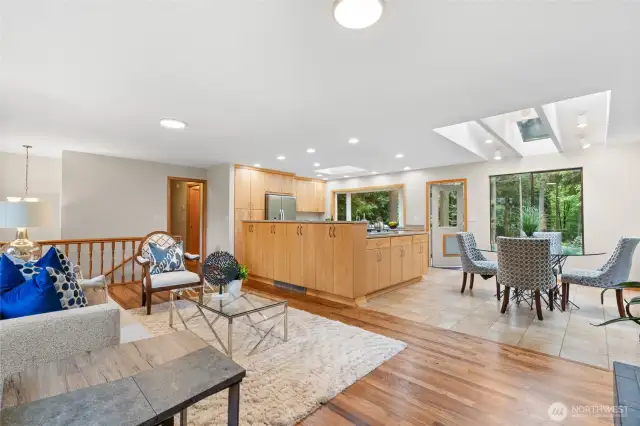 Open floor plan to Kitchen & Dining areas.