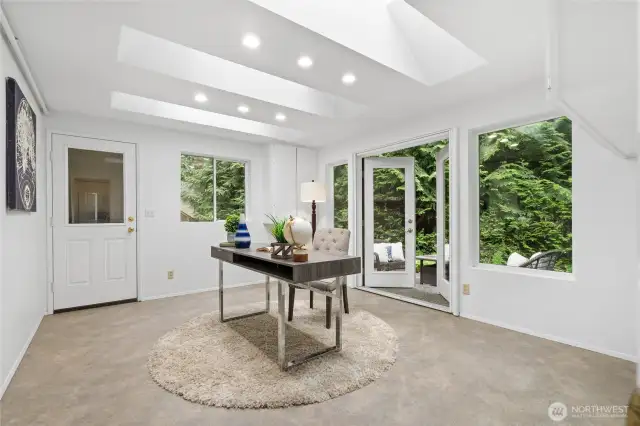 Home Office is a perfect place for remote work with French doors to the backyard.