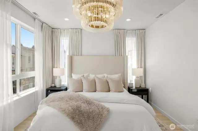 3rd Floor master bedroom includes bright, corner windows, en-suite bath and walk in closet, central AC
