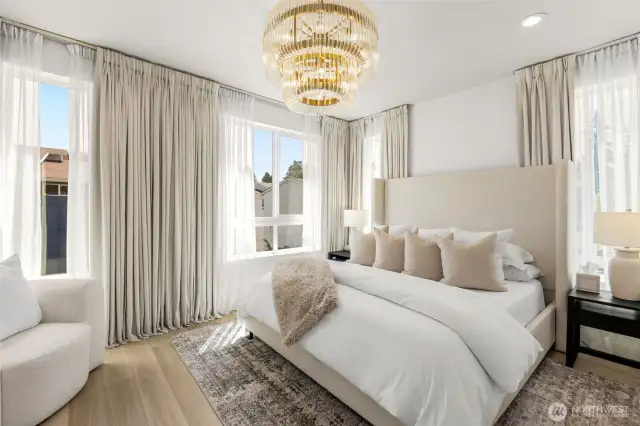 3rd Floor master bedroom includes bright, corner windows, en-suite bath and walk in closet, central AC