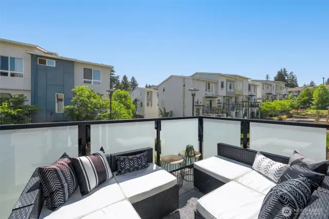 Large, corner, patio with community views off of living room.