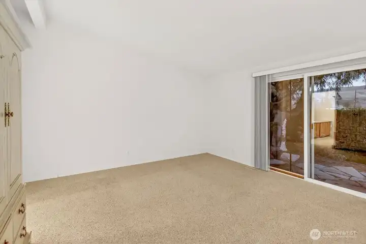 Primary with sliding doors to patio