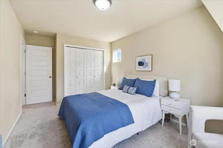 Additional bedroom with closet storage, natural light, and flexible use for sleeping, study, or hobbies.