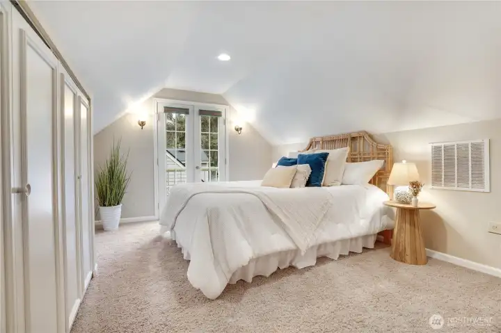 Upstairs suite has Juliette balcony and 2 closet areas to spread your favorite wardrobe options.  A private bathroom awaits!