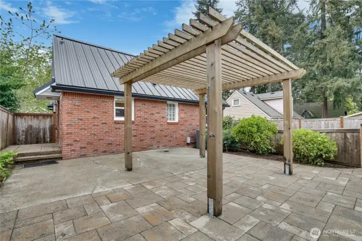 Outside you'll love the designs patio surrounded by beautiful and mature plants to bring color year round!  Also, heat pump and A/C will keep you comfortable in any temperature.