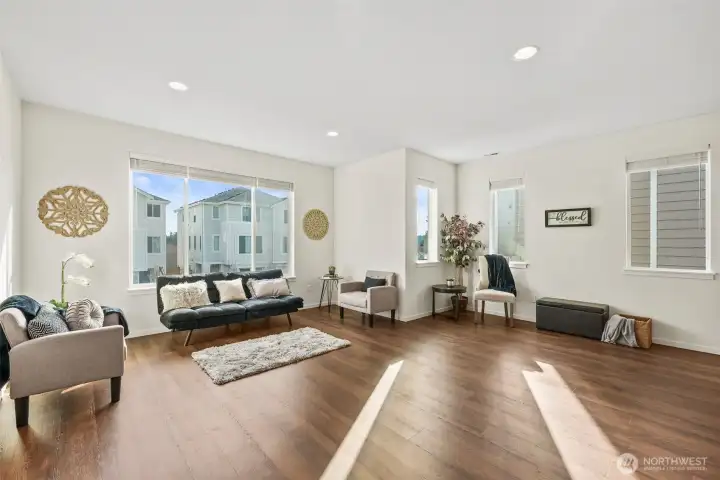 Expansive open-concept living area with abundant natural light and flexible layout options.