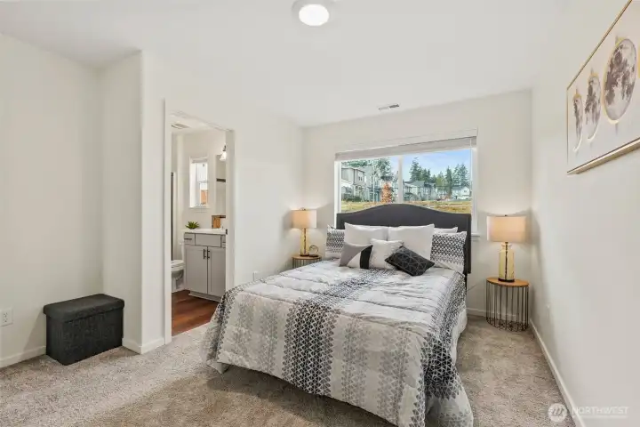 Comfortable primary suite with en-suite access and clean, modern finishes