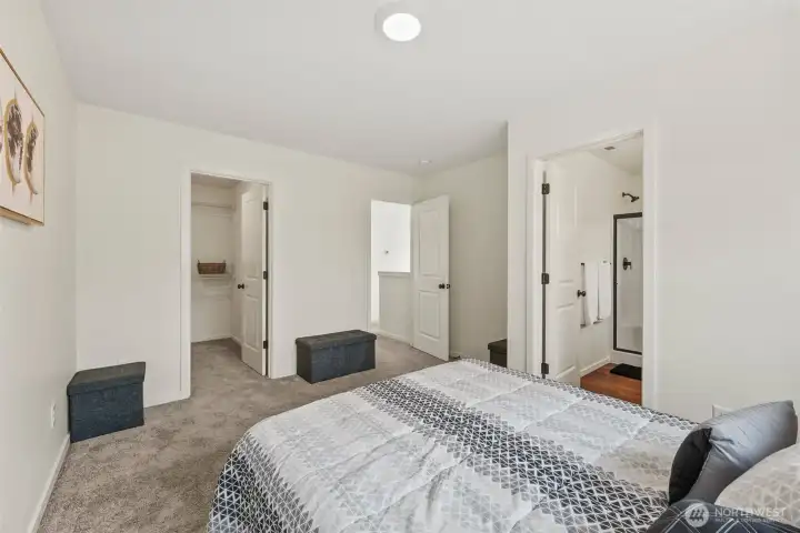 Primary suite featuring easy access to en-suite bath and walk-in closet.