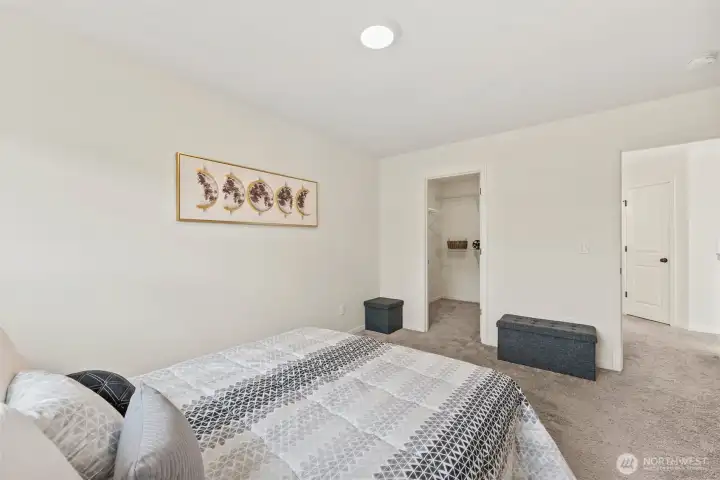 Expansive primary suite layout with multiple functional zones and great flow.