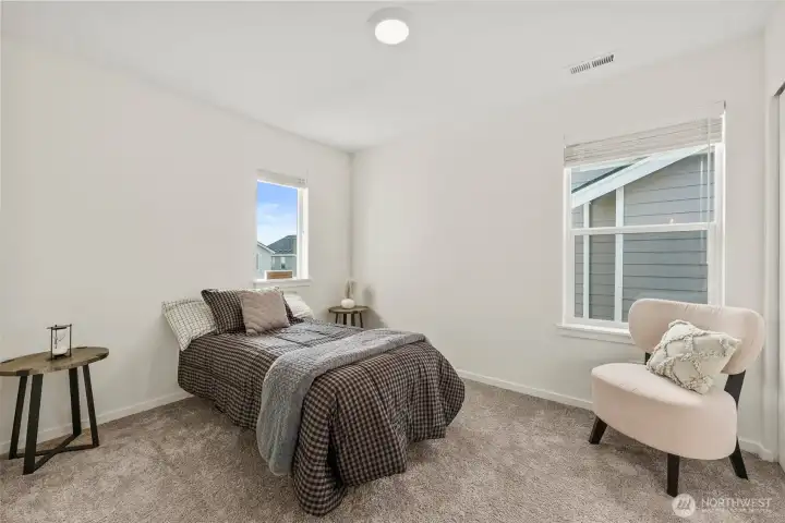 Spacious secondary bedroom offering ample room for furniture and flexible use.