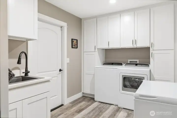 Enlarged Laundry Room has space for the deep freezer and a sink. Enlarged Laundry Room has space for the deep freezer and a sink.