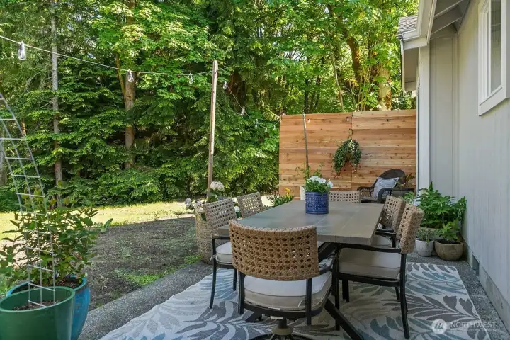 Enjoy the privacy of your rear patio. The hummingbirds love coming to this area from the forested land. This area is accessed from the Primary Bedroom. Enjoy the privacy of your rear patio. The hummingbirds love coming to this area from the forested land. This area is accessed from the Primary Bedroom.
