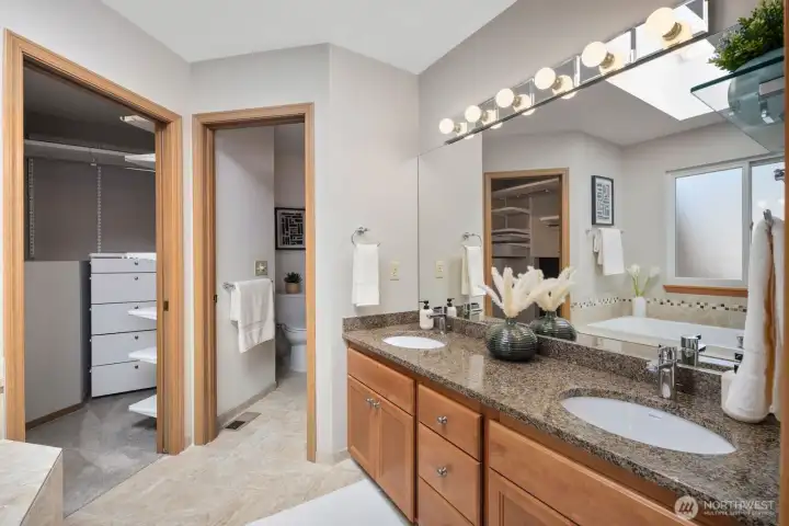 Primary bathroom with dual sinks.