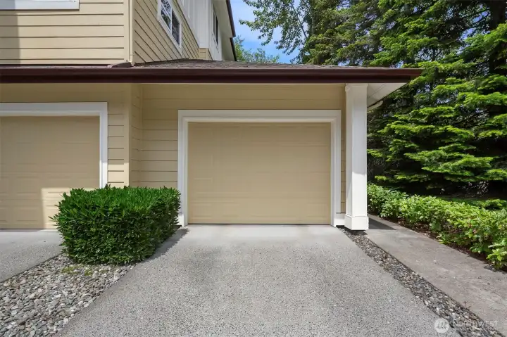 Coveted private, oversized (one of the largest in complex) 1-car garage + full-length driveway