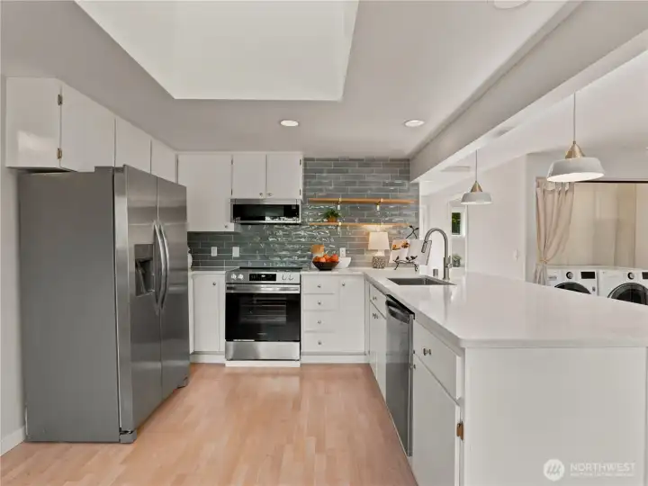 New appliances, counters and backsplash