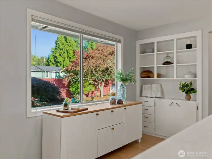 Built in storage. Sideboard/coffee bar stays!
