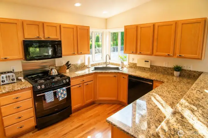 A modern, inviting kitchen designed for effortless cooking and everyday connection.
