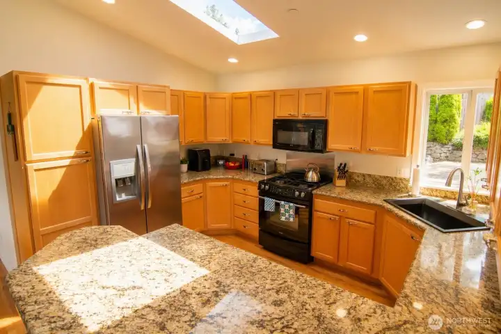 A modern, inviting kitchen designed for effortless cooking and everyday connection.