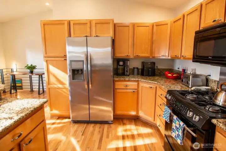 A modern, inviting kitchen designed for effortless cooking and everyday connection.