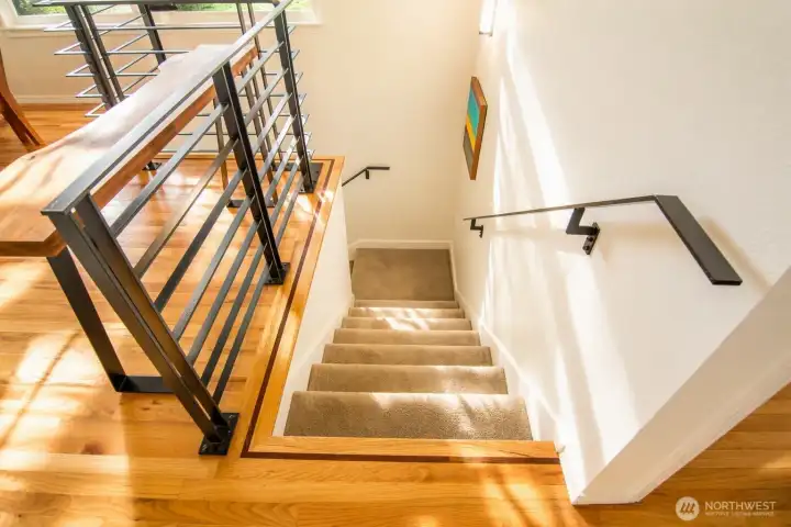 A clean, modern stairway connecting the home’s bright, open spaces.