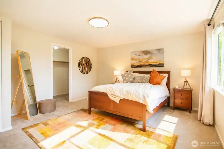 The home’s second bedroom provides a warm, versatile retreat.