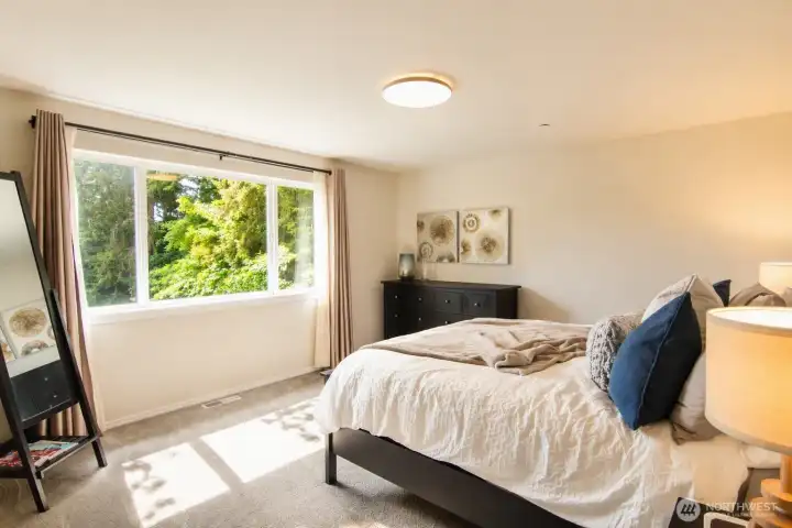 A welcoming third bedroom ideal for guests, work, or everyday living.