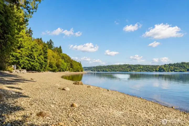 Shoreline of the private community beach, offering quiet waterfront access.