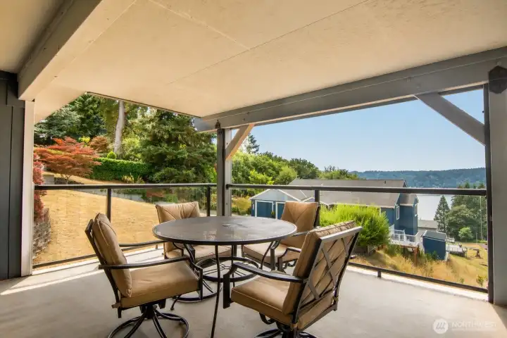 The home’s lower deck provides a sheltered, versatile spot for gatherings.