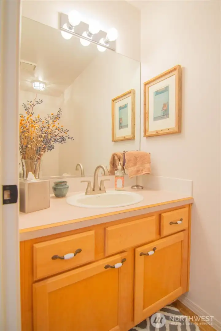 A well-appointed main-floor guest half bath offering convenience and style.