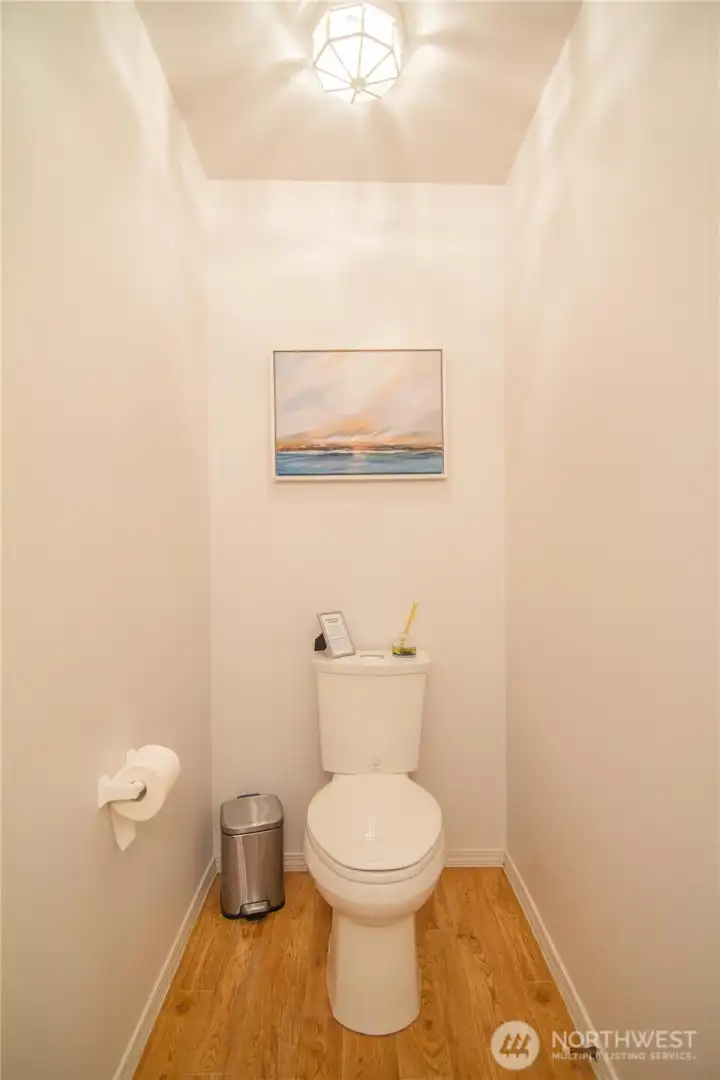 A well-appointed main-floor guest half bath offering convenience and style.