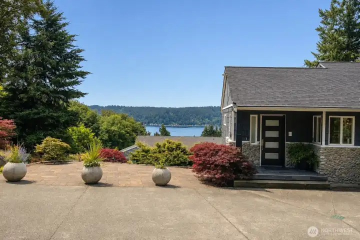 A view along the side of the home, highlighting its structure and landscaping.