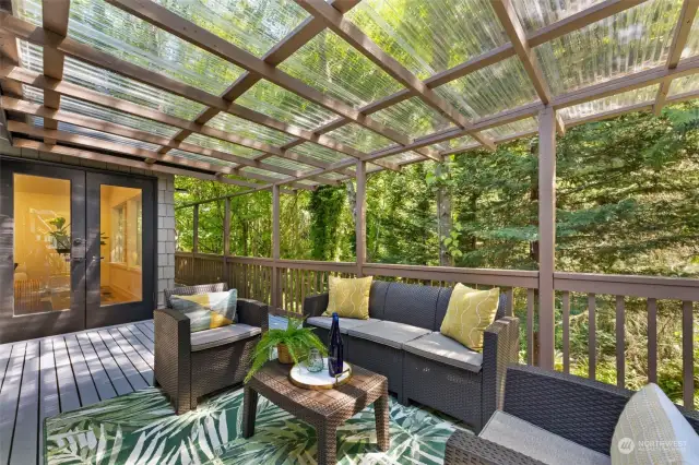 The huge, partially covered, wrap-around deck is perfect for afternoon wine or BBQs with friends!