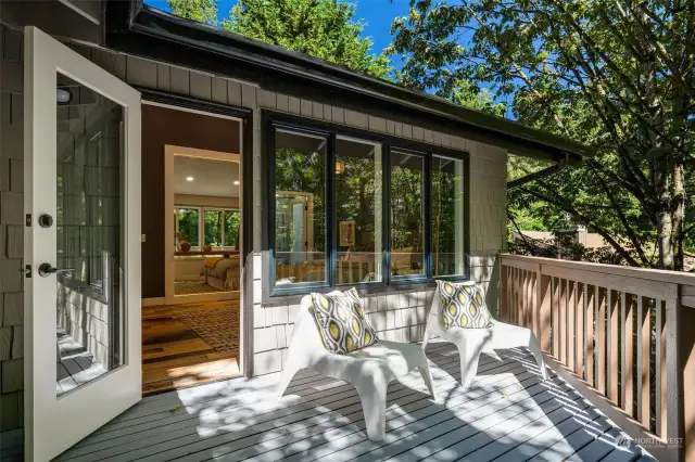 The primary opens to a private deck area ~ perfect for morning coffee!