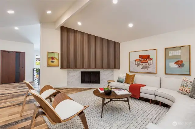 Soaring ceilings and large open spaces, like this living room, really make this home feel so spacious. Many thoughtfully added modern touches throughout.