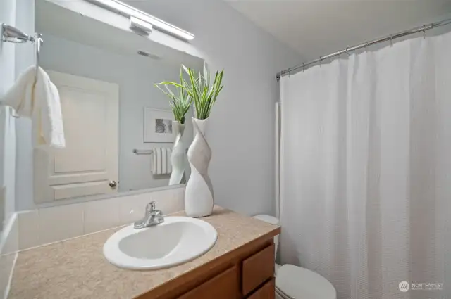 2nd floor guest bathroom with tub/shower combo. Located next to 2nd bedroom.