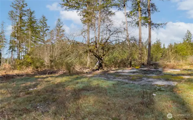 A former manufactured home sat on the pad - well head nearby