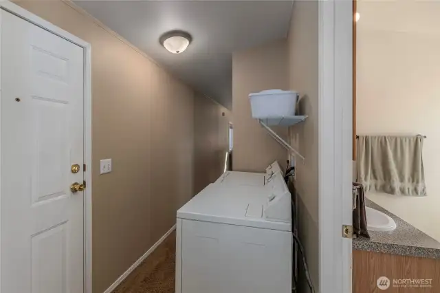 Laundry area next to bath and second exit
