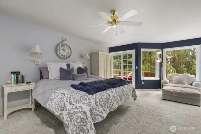 The spacious primary bedroom is the retreat you’ve been dreaming of—complete with a fireplace and private deck access.
