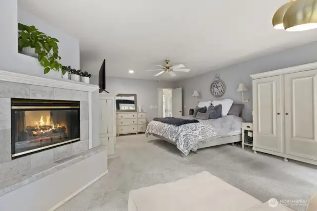 With a dual-sided fireplace that adds warmth to both the bedroom and the spa-like soaking tub.