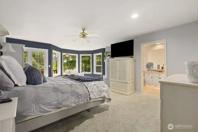 This spacious primary suite has room for all your bedroom essentials—and then some.