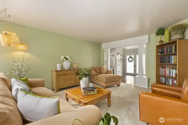 The primary is located on the East side of the home along with the living room & powder room.